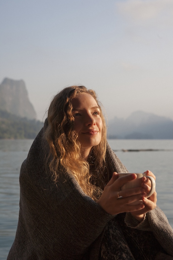 Woman warm in the morning sun