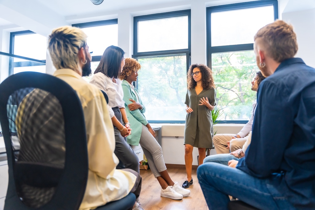 Young woman leading therapy session