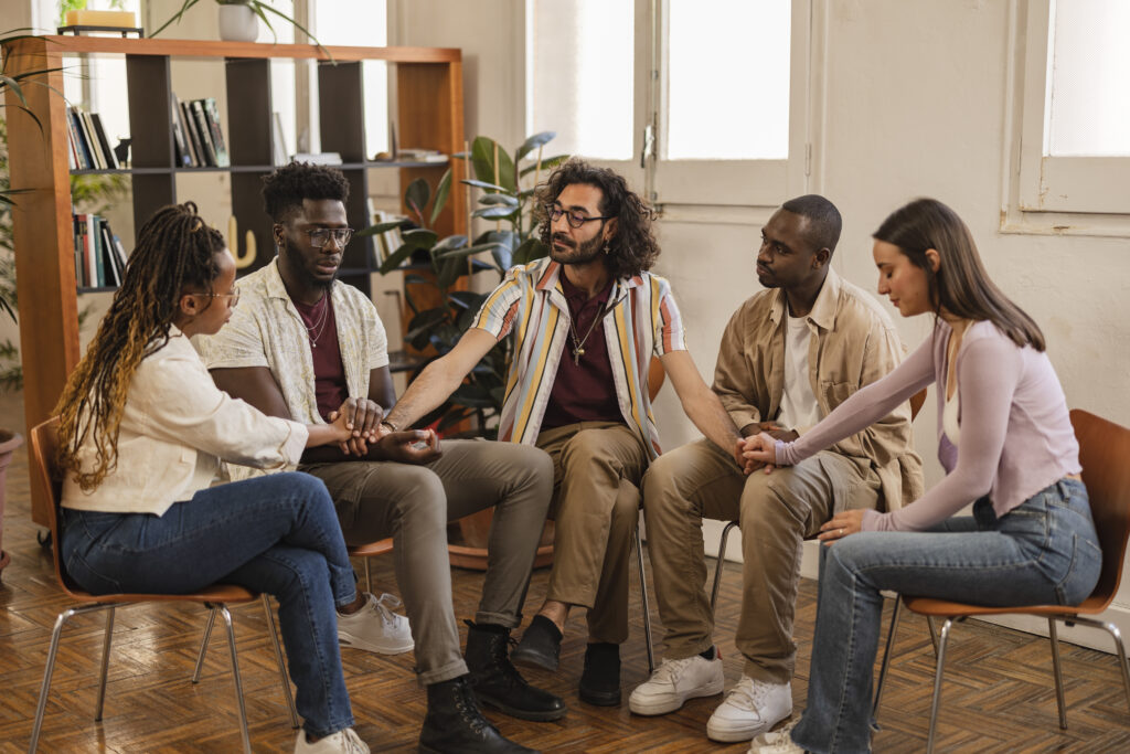 Diverse group therapy session in mental health treatment
