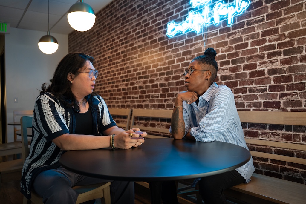 Therapist meeting one-on-one with a client at Element Q Healing Center, reflecting LGBTQIA+ affirming and trauma-informed mental health care.