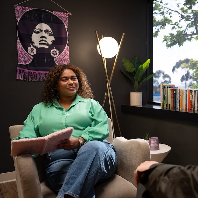Therapist and client engaged in an individual therapy session at Element Q Healing Center, reflecting LGBTQIA+ affirming and trauma-informed mental health treatment.